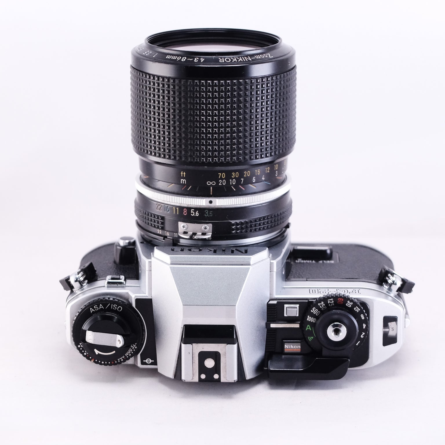 Nikon FG-20 (Silver) + Zoom NIKKOR 43-86/3.5