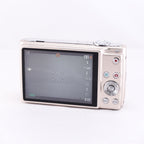 Nikon COOLPIX S5 compact digital camera with LCD screen and control buttons, showcasing sleek design and functionality.
