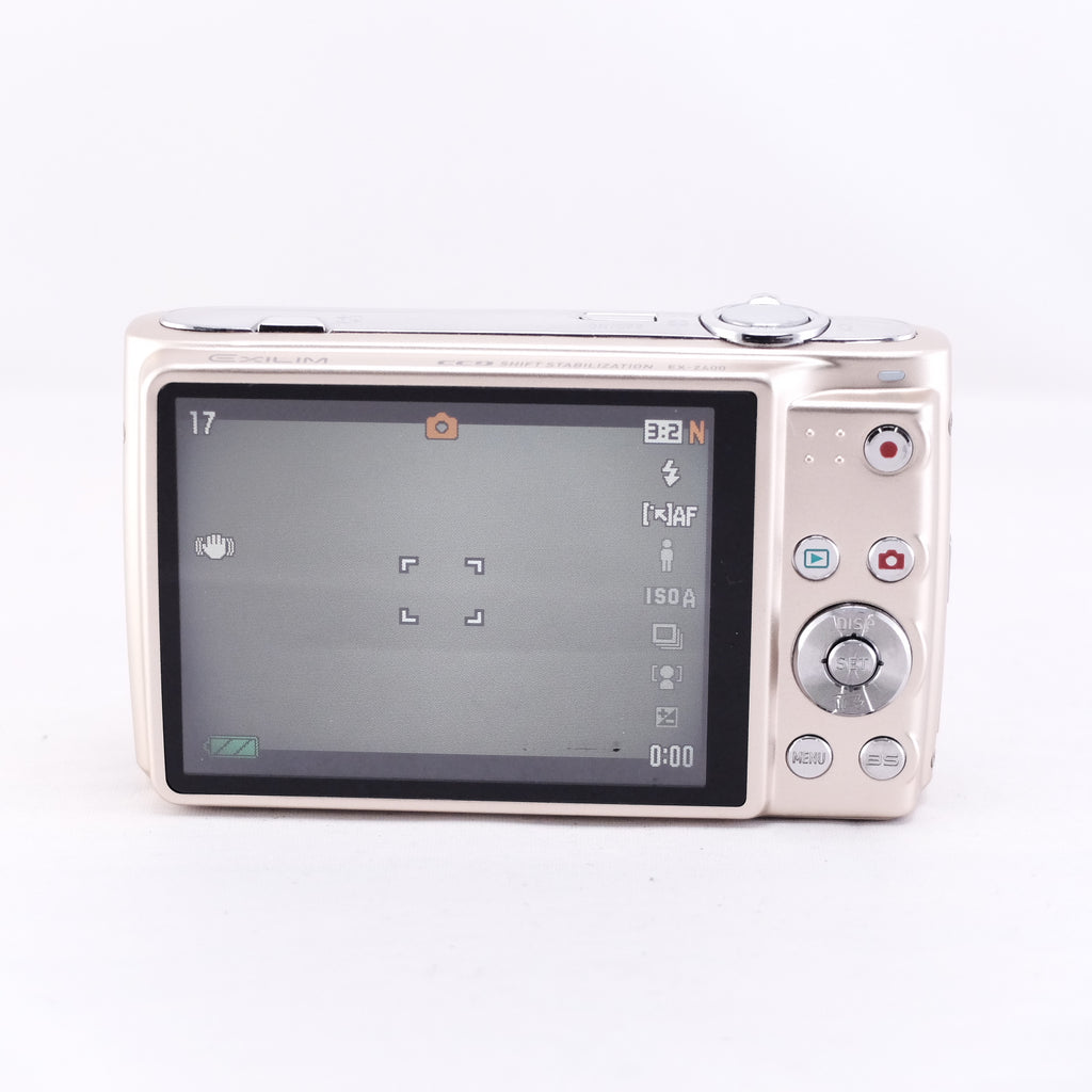Nikon COOLPIX S5 compact digital camera with LCD screen and control buttons visible, designed for easy photography.